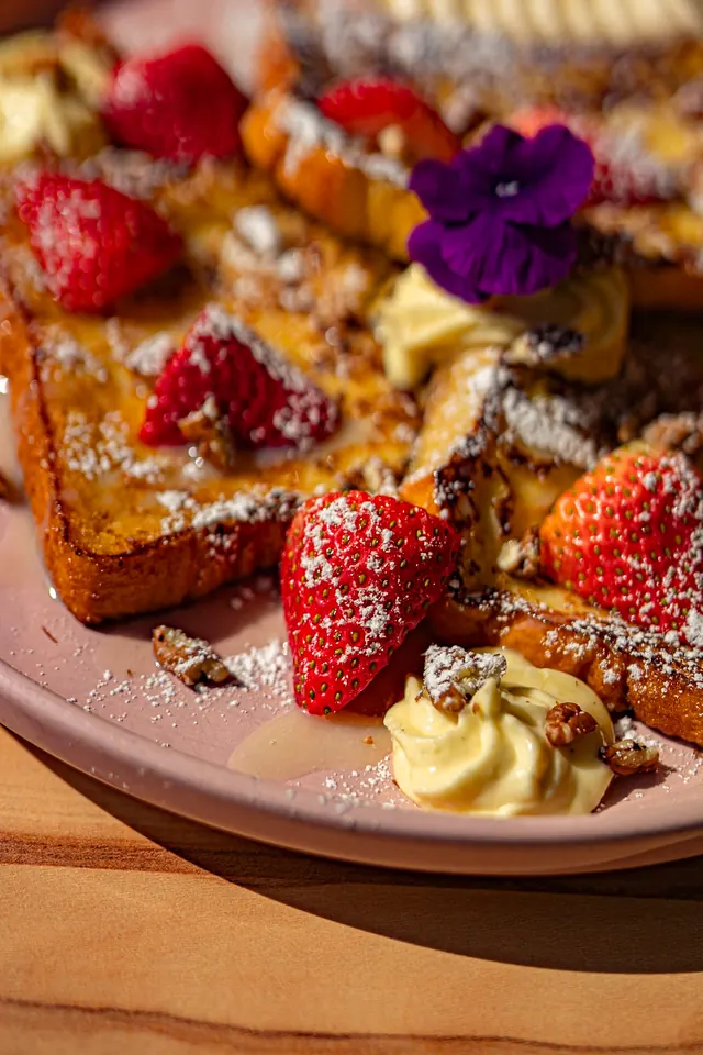 French toast topped with fruit.